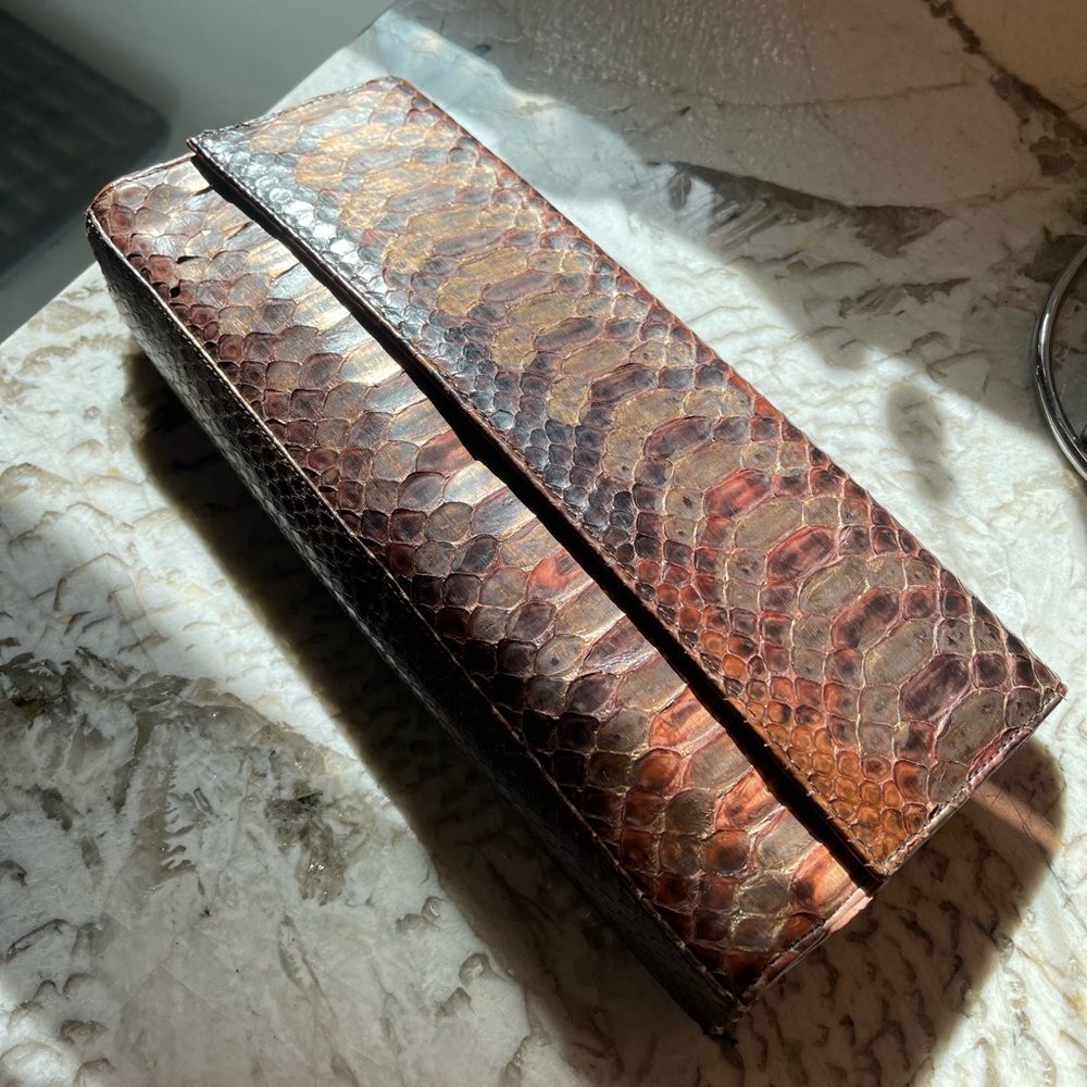 Stuart Weitzman snakeskin clutch